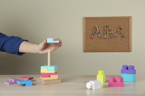 a picture of blocks with the word ABA behind it